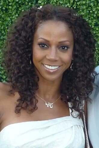 Holly Robinson Peete smiling at a public event.